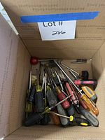 Box showing entire assortment of screwdrivers and bit