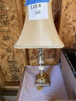 Full view of lamp with shade on table