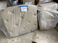 Front view of main headboard panel and side panel in protective plastic