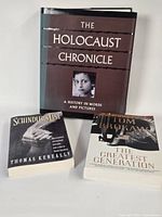 Front view of all three books showing covers