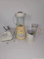 Front view of all three appliances showing cords and attachments