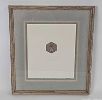 Full view of framed etching showing matting and frame