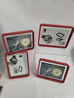 All four red Umbra frames front view