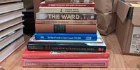 Stack of ten Canadian history books showing spines and titles