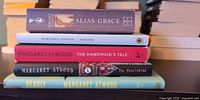 Stack of five Margaret Atwood books showing titles and condition