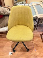 Front view of chartreuse rolling desk chair