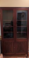 Front view of rosewood hutch doors closed