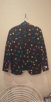 Front view of OppoSuits Tetris jacket hanging