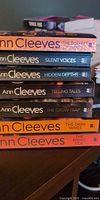 Stack of seven Ann Cleeves Vera novels showing visible spines and titles