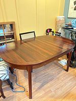 Top and legs of Brazilian rosewood dining table