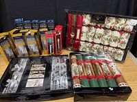 Overall lot showing boxed window candles and four boxes of holiday crackers