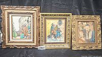 Group shot of three framed Artini Judaica etchings