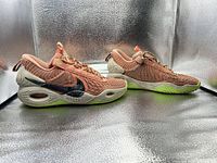 Lateral view of both shoes showing design, colorway, midsole and outsole