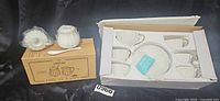 Boxed Pukka Home/Brew To A Tea six-cup tea set beside boxed Sweejar creamer & sugar set