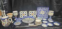 Full lot overview showing all ceramic pieces and knife