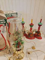 Two bubble lamps, three flicker flame lamps and original box visible