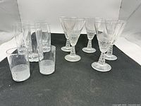 Group shot of all 12 glasses: 5 Athlone wine stems, 2 low tumblers, 5 tall highball glasses