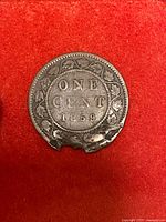 Reverse showing ONE CENT 1859 within maple leaf wreath