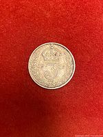 Reverse of 1918 threepence with crowned 3 and wreath