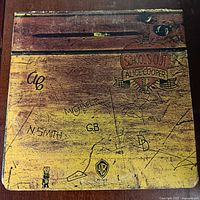 Front cover wood-grain graffiti design with title ribbon