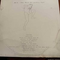 Front album cover showing title artwork and water staining