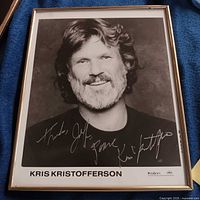 Framed black-and-white Kris Kristofferson signed photo