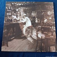 Front sleeve showing bar scene artwork