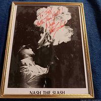 Full view of framed signed promotional photograph