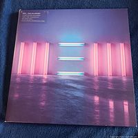 Front sleeve of Paul McCartney “New” vinyl LP with sticker
