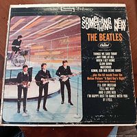 Front jacket showing album art and title