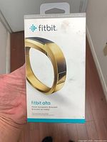 Front of boxed Fitbit Alta gold metal bracelet