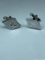 Front view showing starburst design and bullet back