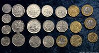 Obverse sides showing denominations and dates of twenty-two French coins