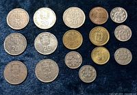 Fronts of 16 Portuguese coins