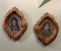 Both wall plaques side by side