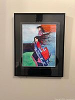 Front view of framed watercolor showing artwork and signature