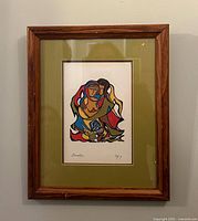 Front view of framed print showing artwork, mat and frame