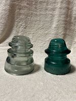 Front view of both insulators showing color and shape