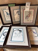 Group shot of five of the six framed prints showing frames, mats and subjects