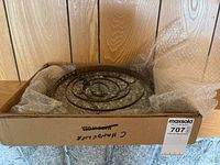 Chandelier parts packed in box with bubble wrap