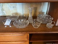 Overall view of all glass and crystal items on shelf