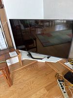 Front view of LG television on stand