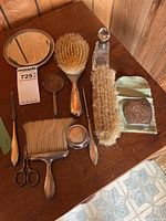 Full view of all nine vanity items on table