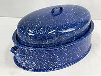 Covered blue speckled enameled roasting pan