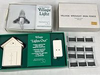 All three boxed Department 56 accessory sets opened to show contents