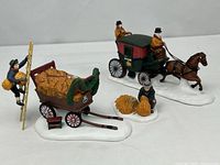 Full view of all figures: Thatchers set three pieces and Dover Coach