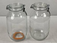 Both glass jars front view showing size, shape and gasket presence