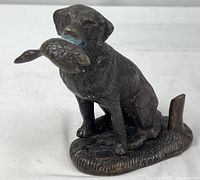 Full view of bronze retriever figurine