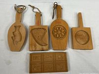 Group shot of five wooden molds