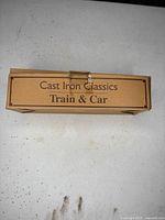 Closed box labelled "Cast Iron Classics Train & Car"